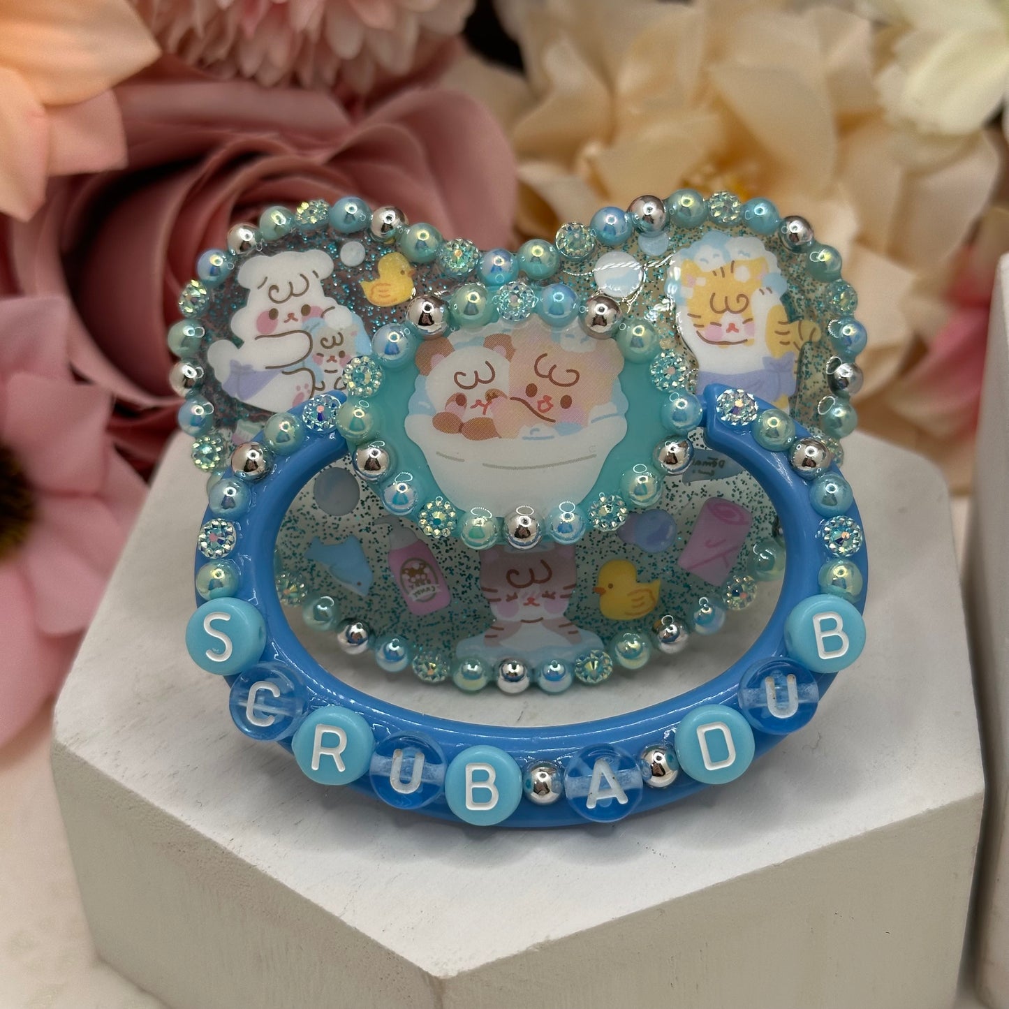 Scrub a dub resin pacifier